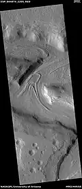 Glaciers moving in two different valleys, as seen by HiRISE under HiWish program Location is Ismenius Lacus quadrangle.