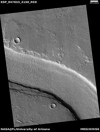 Layers exposed along Hrad Vallis, as seen by HiRISE under HiWish program