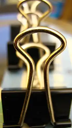 Clip with golden loops