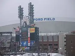 Ford Field on Super Bowl XL Sunday, countdown to kickoff on Comerica Park's scoreboard.