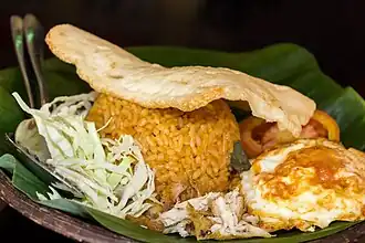 Nasi goreng with chicken, egg and prawn cracker
