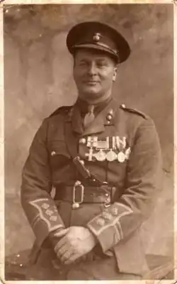 A soldier posing for a photograph