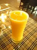 A glass of mango juice