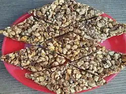 Georgian snack Gozinaki made from roasted walnuts and honey