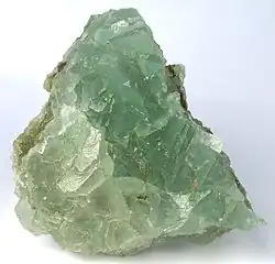 Sharp halite crystals that have this green color from inclusions of copper minerals (atacamite?)