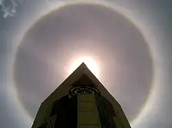 22° halo around the Sun, above PT Semen Padang building at Padang, Indonesia, October 2, 2009, at 11:09 am