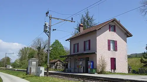 Two-story building with gabled roof