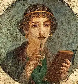 Image 11Woman holding wax tablets in the form of the codex. Wall painting from Pompeii, before 79 CE. (from History of books)
