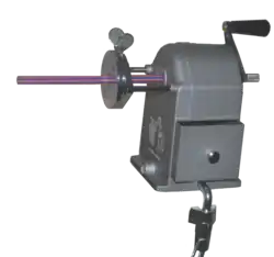 Hand-cranked planetary sharpener with spring-driven pencil holder. The small knob behind the crank is a sharpness regulator.