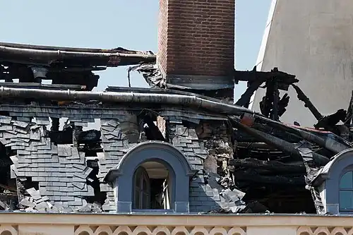 A portion of the damaged roof on the east side of the court