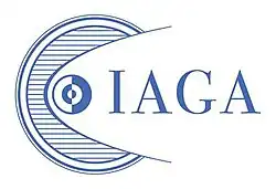 Stylized line drawing of circles symbolizing orbits in the Solar System, with letters "IAGA" to the right. Dark blue lines on white.