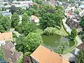 Monastery courtyard with the monastery pond seen from the steeple of St. Laurentii Church