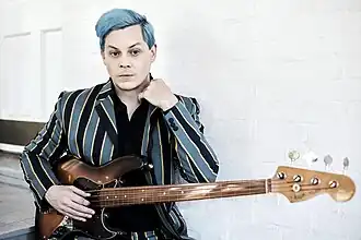 Singer Jack White wearing striped Madcap England blazer, 2021.