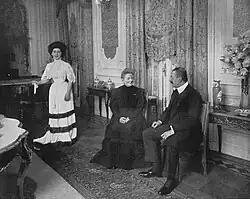 James von Bleichröder in his Berlin home with the famous singing teacher Mathilde de Castrone-Marchesi (middle) und seiner Gattin, 1908