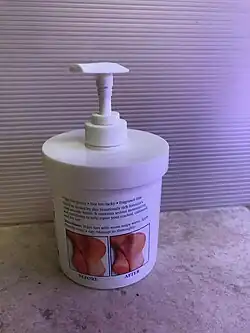 PP jar of skin cream with pump dispenser