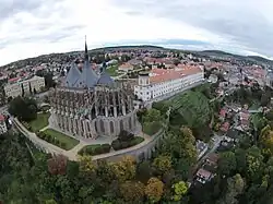 Aerial view of Kutná Hora with the Church of Saint Barbara and Jesuit College in the front