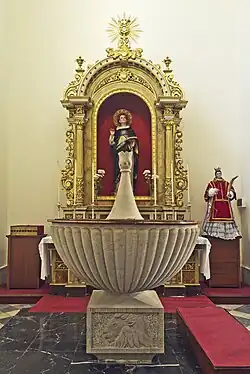 Altarpiece of Saint Thomas Aquinas and baptismal font
