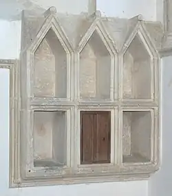 13th-century aumbry in the chancel