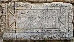 Roman funerary plaque in the wall of the church