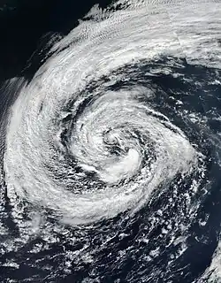 Satellite image of Leslie over the open Northern Atlantic on 27 September, as a weakening hurricane-force extratropical cyclone.