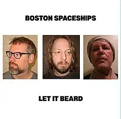 Plain white cover with the band name and album title printed in large black letters. In the center is a row of three photos, one for each band member (left to right, John Moen, Chris Slusarenko, Robert Pollard). In the photos they all sport beards/chin fuzz.