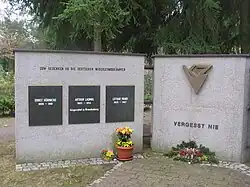 On a memorial to victims killed at Genshagen (right panel), where the letters KZ are not nationality-letters but rather are the German abbreviation for Konzentrationslager (concentration camp)