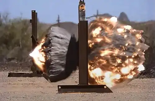 M1147 blasting through a reinforced concrete wall
