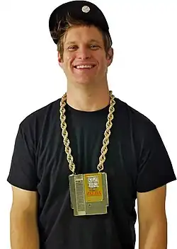 MC Lars wearing a Legend of Zelda necklace in 2015
