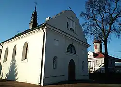 Saint Nicholas church with town hall in background