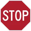 A Stop sign used in English-speaking countries, as well as in most European countries