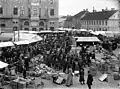 Market at Hovrättstorget with Grand Hotel in the background, early 20th century