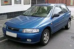 1997–1998 Mazda 323P hatchback (Europe) with 1997 Mazda's logo