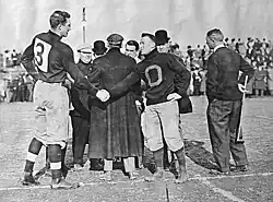 Milton Portmann (Left) shakes hands with Oberlin captain Glen Gray (Right) November 5, 1910