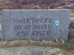 Latitude and longitude marker at Vardetangen