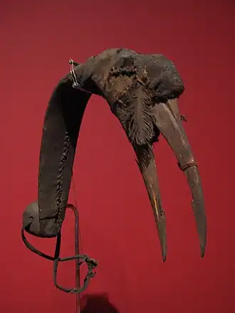 Burtu wooden mask, used during bird hunting; Museum of Ethnology, Vienna. The hunter would tie the mask around his head and imitate the bird's movement.