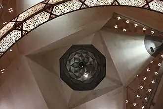 Punctures and sculptural light fixtures detail out geometric patterns and designs