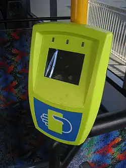 A first generation myki reader on a bus