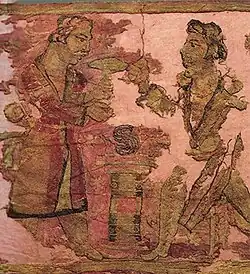 Yuezhi nobleman and priest over fire altar. Noin-Ula carpet.[10]
