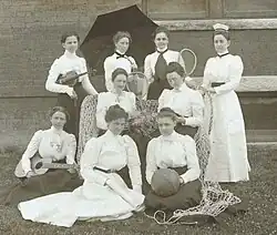 Photograph of members of the State Normal and Industrial School Faculty Tennis Club in 1900