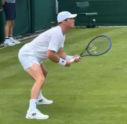 Tennis player with baseball cap