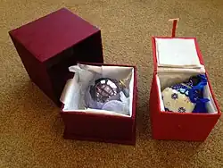 Christmas tree ornaments in storage boxes