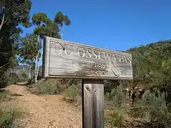 Sign at bottom of pass