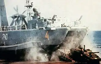 A PT-76 tank emerges from an Aist-class LCAC