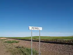 Sign along the railroad tracks in Petrel, North Dakota