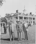 Dutra (in uniform), outside the George Washington home at Mount Vernon, during his visit to the United States.