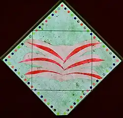 Fibreglass window by John Piper in north wall