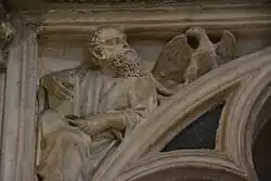 Saint John the Evangelist, with eagle attribute, in a spandrel