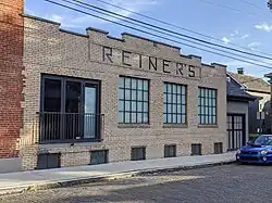 Reiner's facade still extant on Hoster Street
