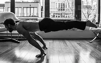An athlete doing planche