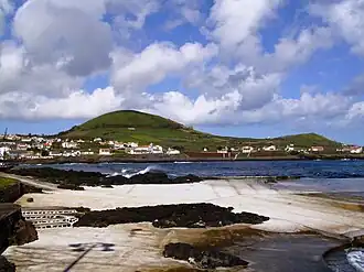 A panoramic vista of the coast of Porto Martins, and the extinct spatter cone Capitão